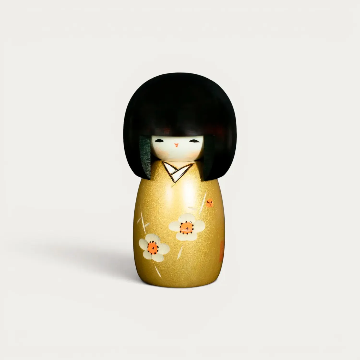 Nishikidori Kaika kokeshi fleurie dorée bois Tohoku