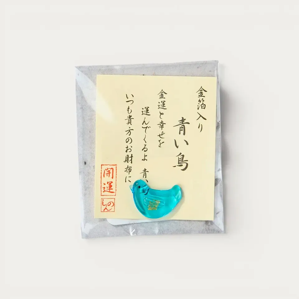 Engimono amulette oiseau bleu feuille d'or