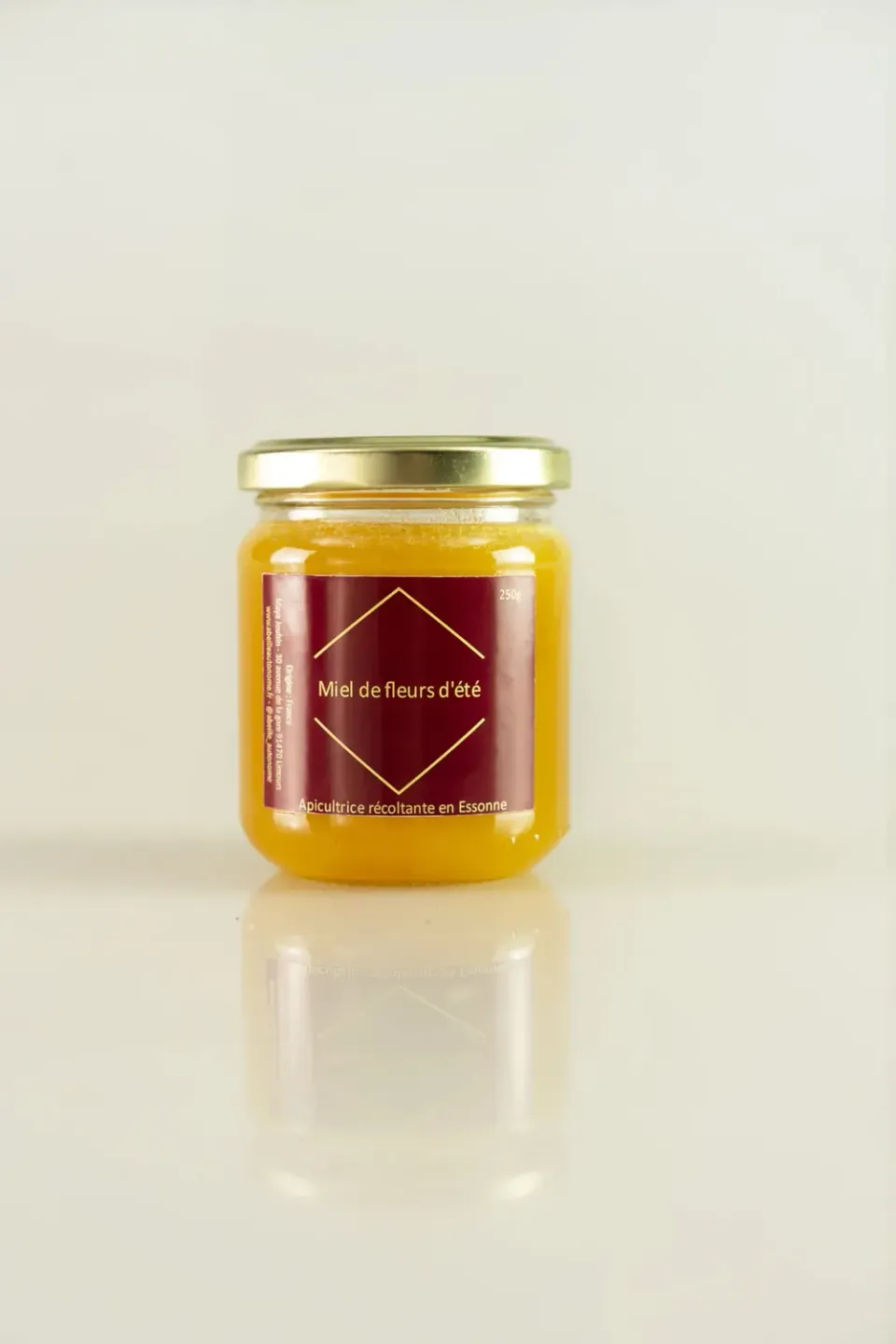 L'Abeille autonome miel fleurs d'été pot 250g liquide floral